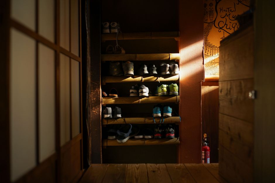 Organized shoe rack in a custom walk-in closet